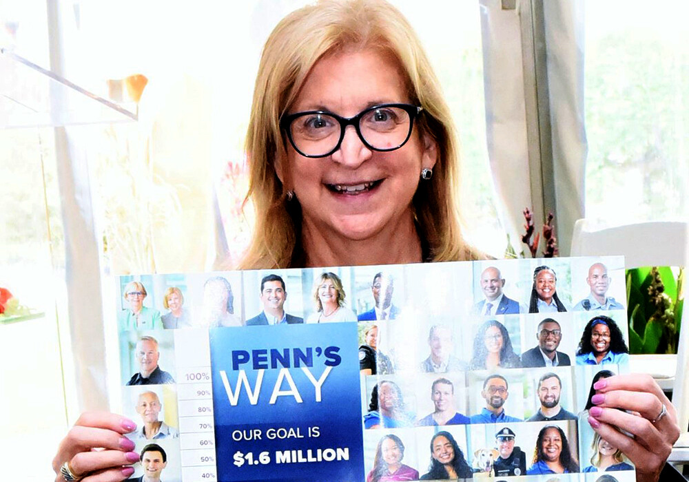 Penn's Way Campaign 2021 volunteer holding poster